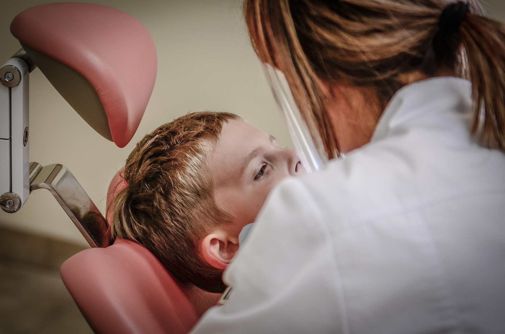 Dentist consulting with a patient